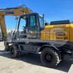 Фото: Колесный экскаватор XCMG XE210WD - 1
