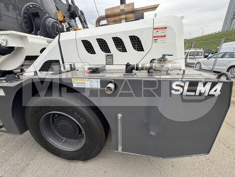 Фото: Самозагружающийся бетоносмеситель с шарнирно-сочлененной рамой SLM4V